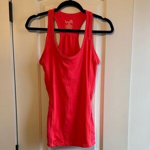 Kyodan Women's Bright Coral Racerback Tank Top with shelf bra without padding.